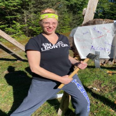 sally saffron axe throwing lime green headband takodah weird smile cathartic self care