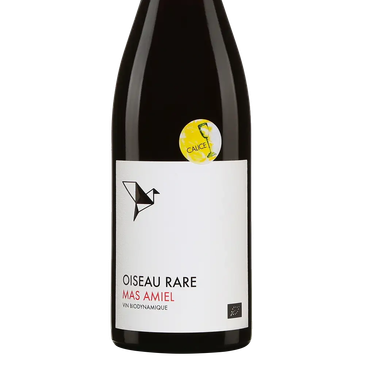 Bottle of Oiseau Rare Mas Amiel biodynamic wine with a bird logo on the label.
