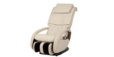 Cream-colored massage chair with foot and calf massager and remote control.