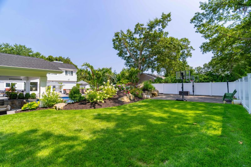 Maintained lawn and landscape at a Long Island property