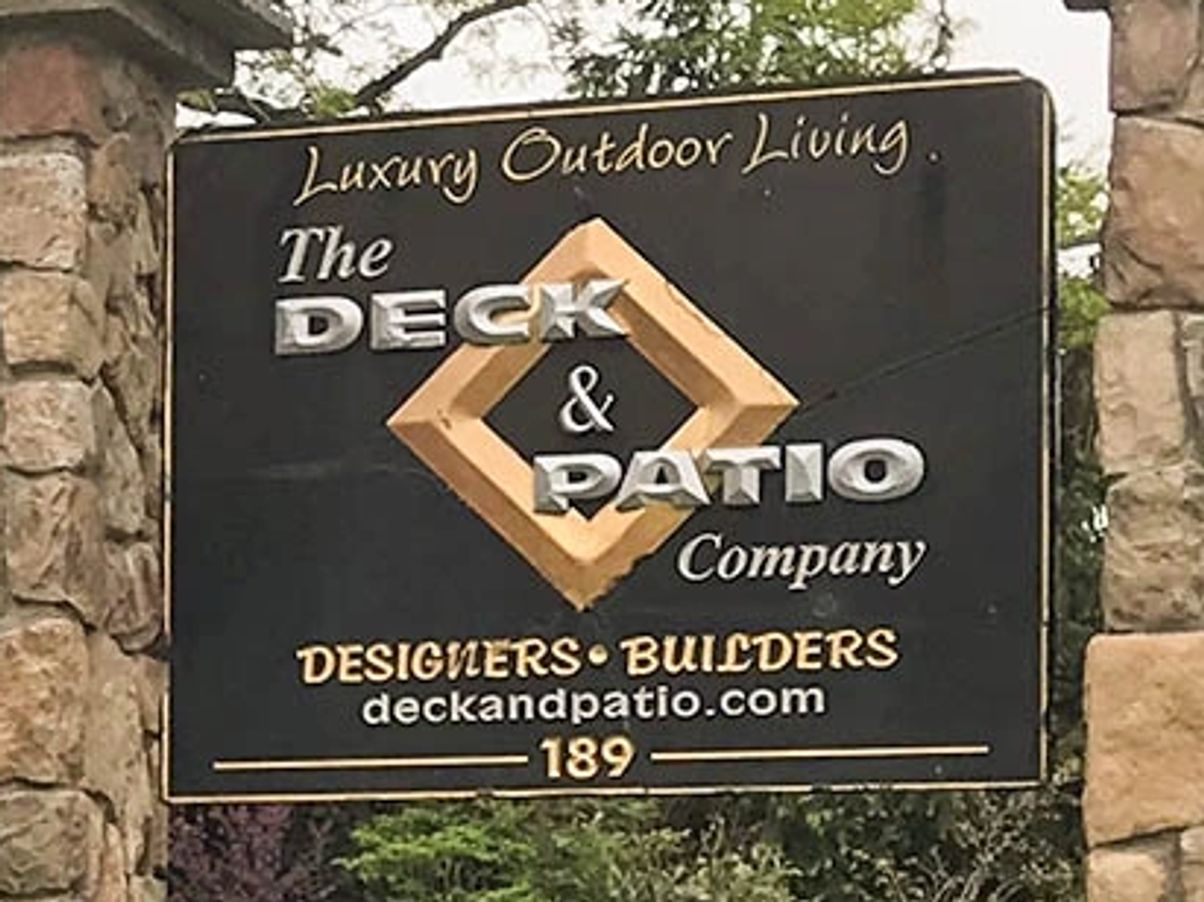 The Deck and Patio Company entrance sign at 635 Pulaski Road in Greenlawn, New York