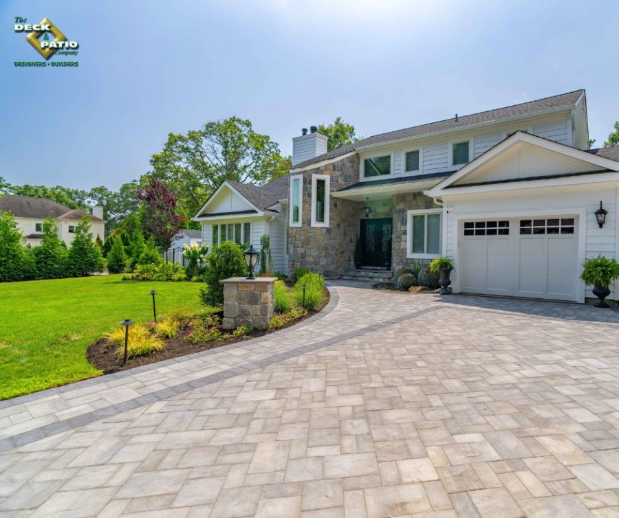 Paver patio and driveway installation on a Long Island property in autumn