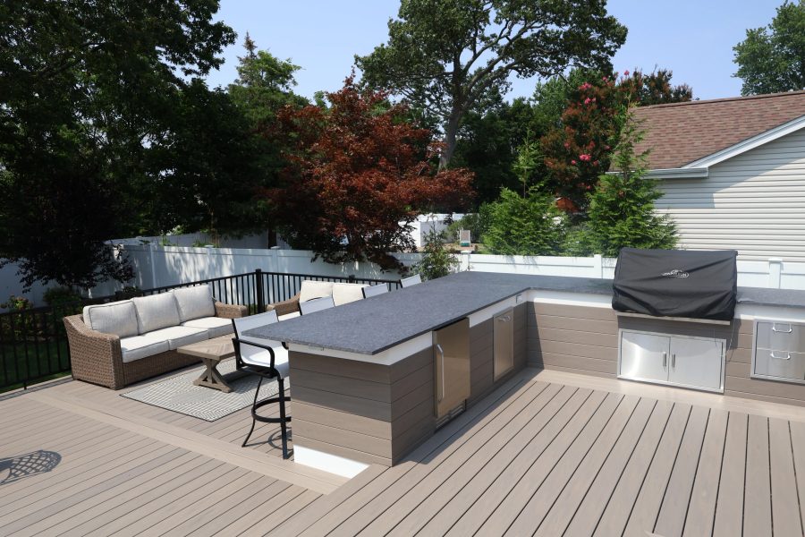 Composite deck with a built-in outdoor kitchen