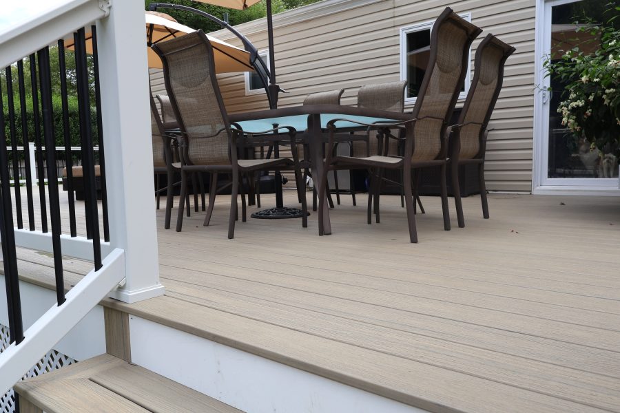 Shaded outdoor dining area off the back of a Long Island home