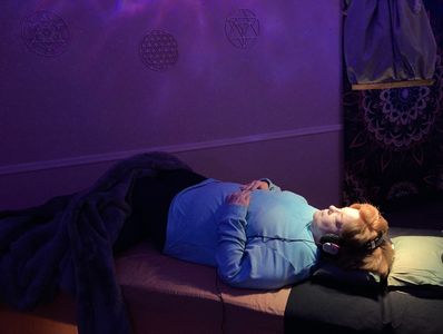 Client supporting nervous system and honing meditation skills while enjoying Lucia Light. Fort Smith