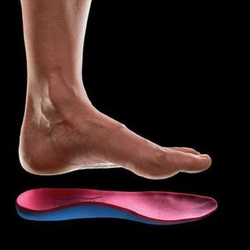 Ergonomic foot insole with arch support for reducing foot pain
