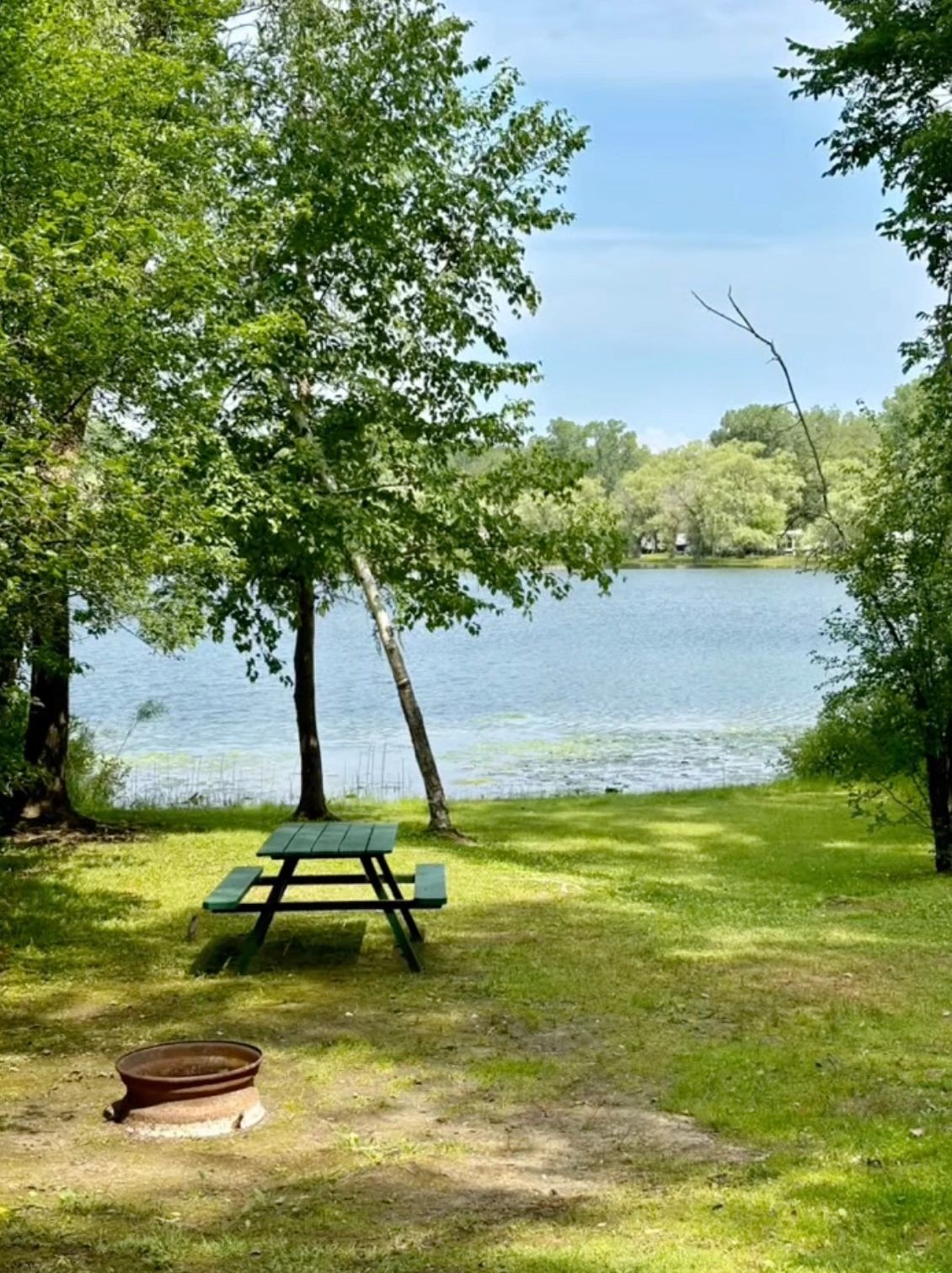 Picnic  table on a lakefront camping site