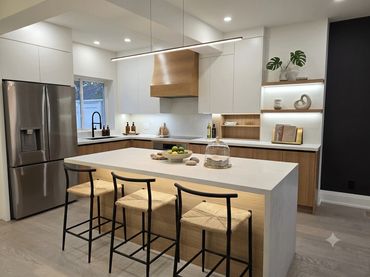 Modern kitchen with wooden accents and a central island.