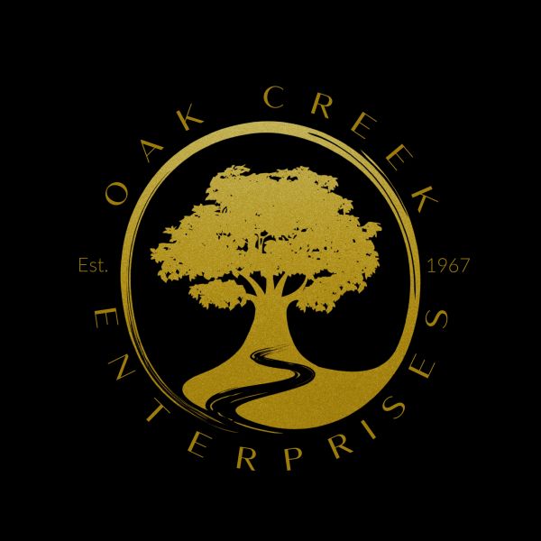 Gold tree logo for Oak Creek Enterprises on black background.