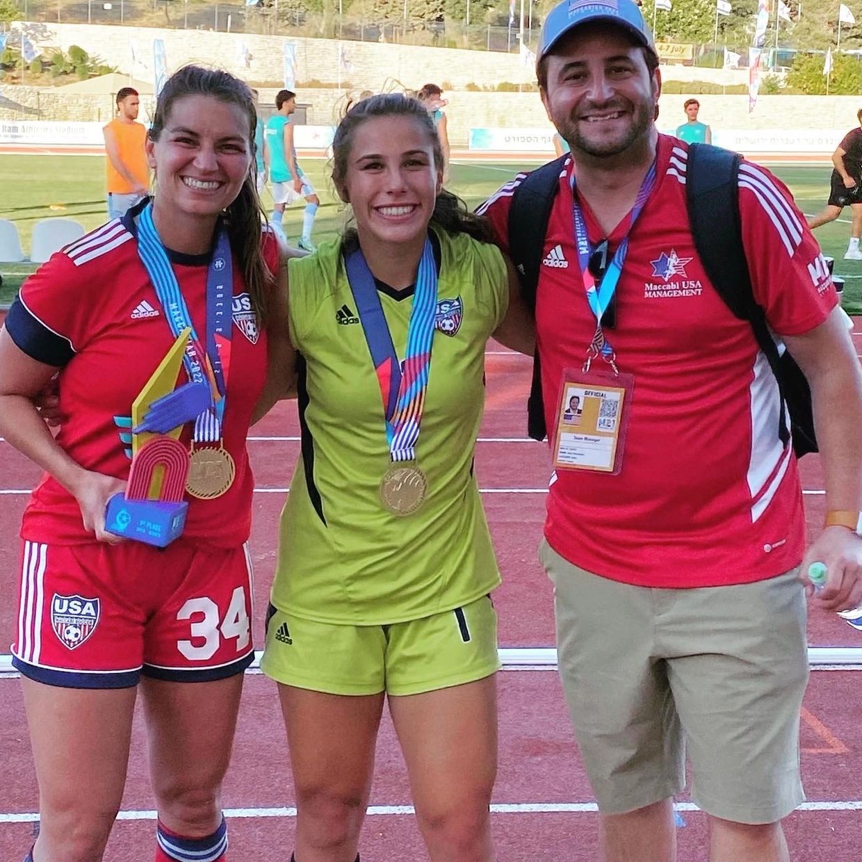 Goalkeeper and her coach and teammate after victory with Macabi national team