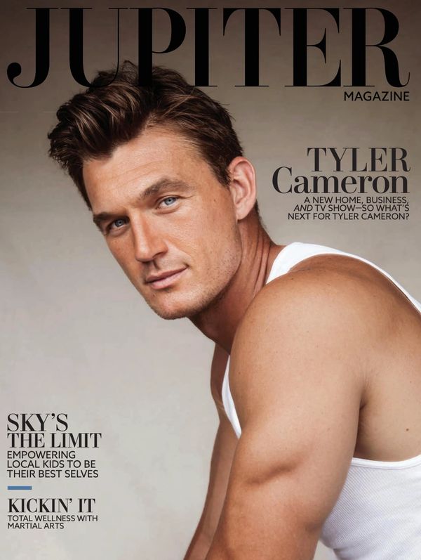 Tyler Cameron on Jupiter Magazine cover in a white tank top.