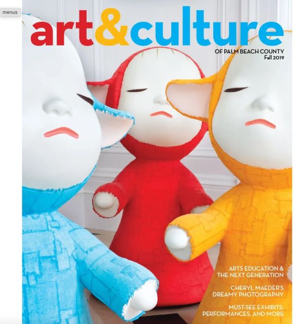 Three colorful abstract figures with closed eyes on magazine cover.
