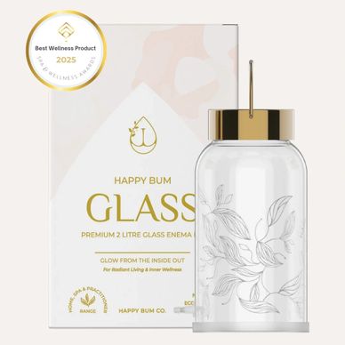 Elegant premium 2-litre glass enema kit with botanical design and gold accents.