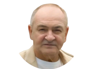 Portrait of an elderly man with a neutral expression.
