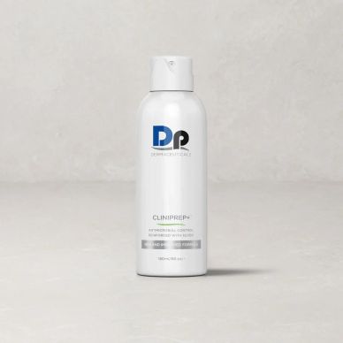 White bottle of Dermalogica Cliniprep spray on a light surface.