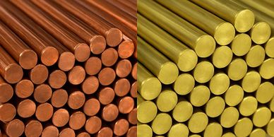 Bundles of copper and brass rods neatly stacked side by side.