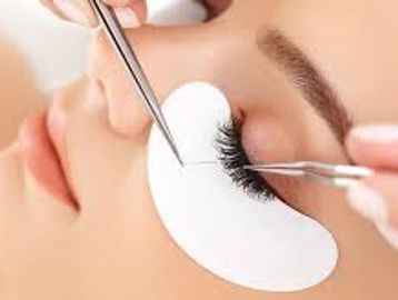 woman receiving eye treatment