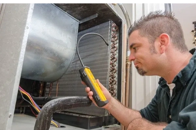  A professional technician performing HVAC system repair in Florida.