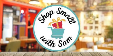 Logo with a shopping cart and gift promoting small businesses with Sam.
