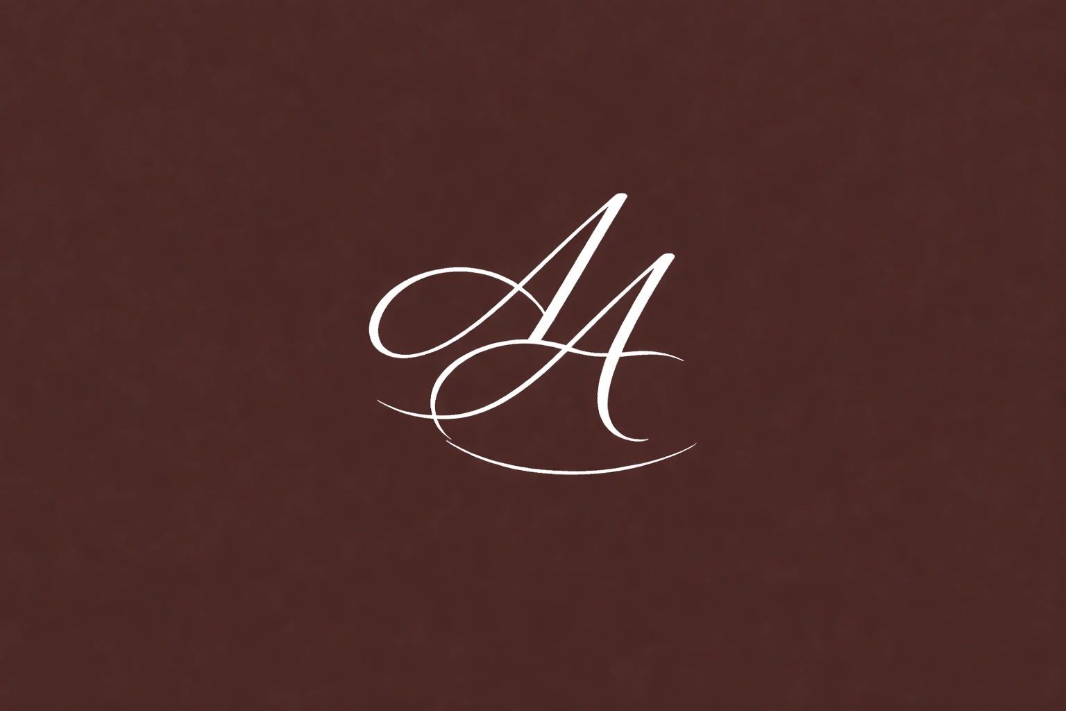 Elegant white calligraphic double 'A' on a brown background.