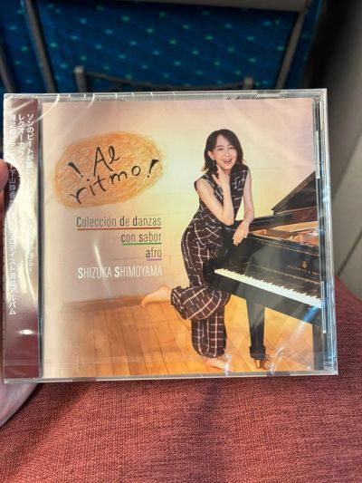 CD cover featuring Shizuka Shimoyama at a piano.