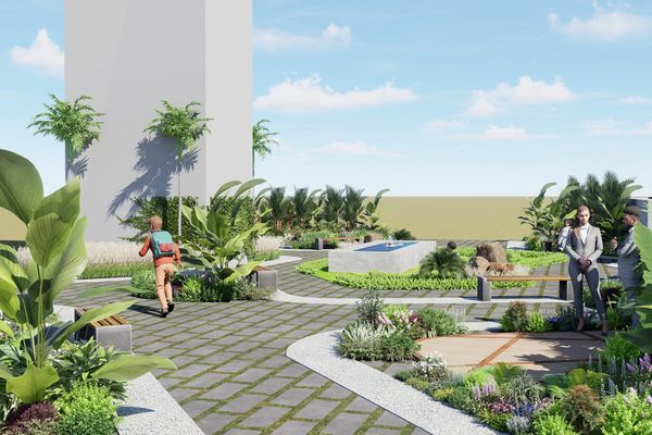 Modern outdoor garden with pathways, greenery, and people enjoying the space.