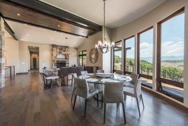 modern dining room with lots of windows