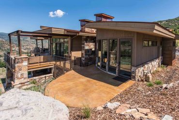 modern stone patio with steel columns