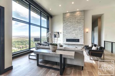 modern living room with stone fireplace