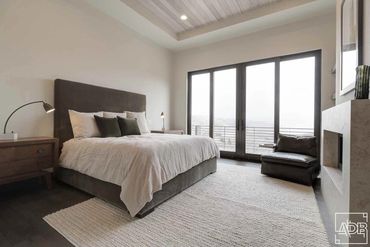 Master bedroom with fireplace and sitting area