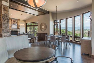 modern dining room with lots of windows