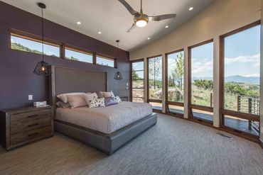 master bedroom with big windows
