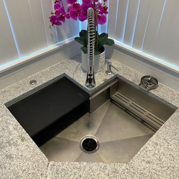 Stainless corner reverse diagonal sink