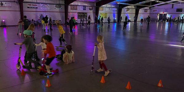Group of people at free family roller night. 