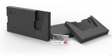 Sleek black cardholder wallet with a credit card.