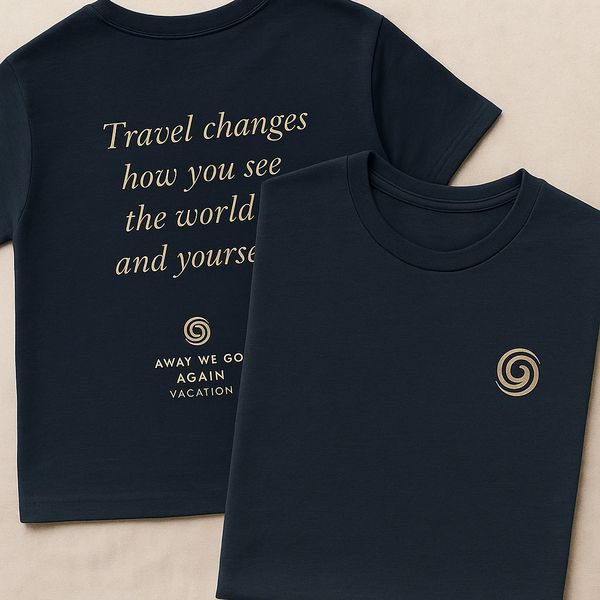 Navy blue T-shirts with inspirational travel quotes and spiral logos.