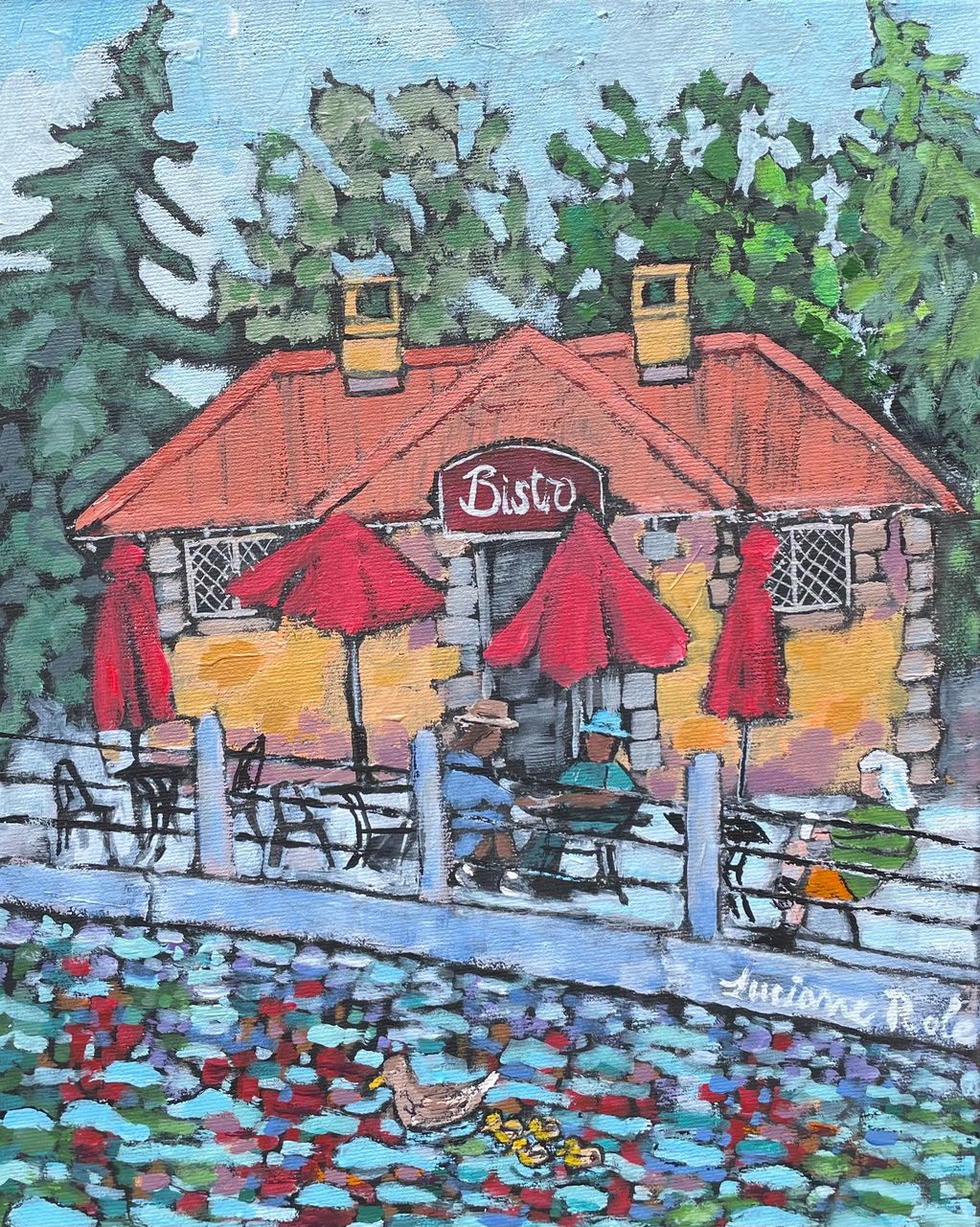 A family of ducks swims past a canal-side bistro on a sunny day.