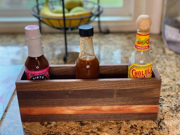 4 ring walnut and mahogany bottle caddy