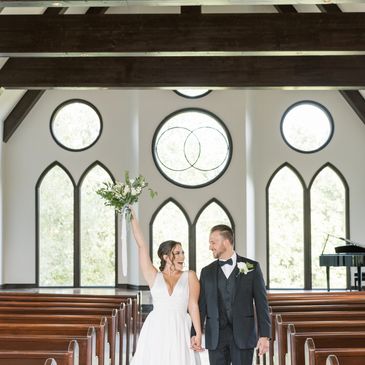 Couple Walking down the aisle at The Bella Donna Wedding Chapel & Event Center, a Tulsa venue. 