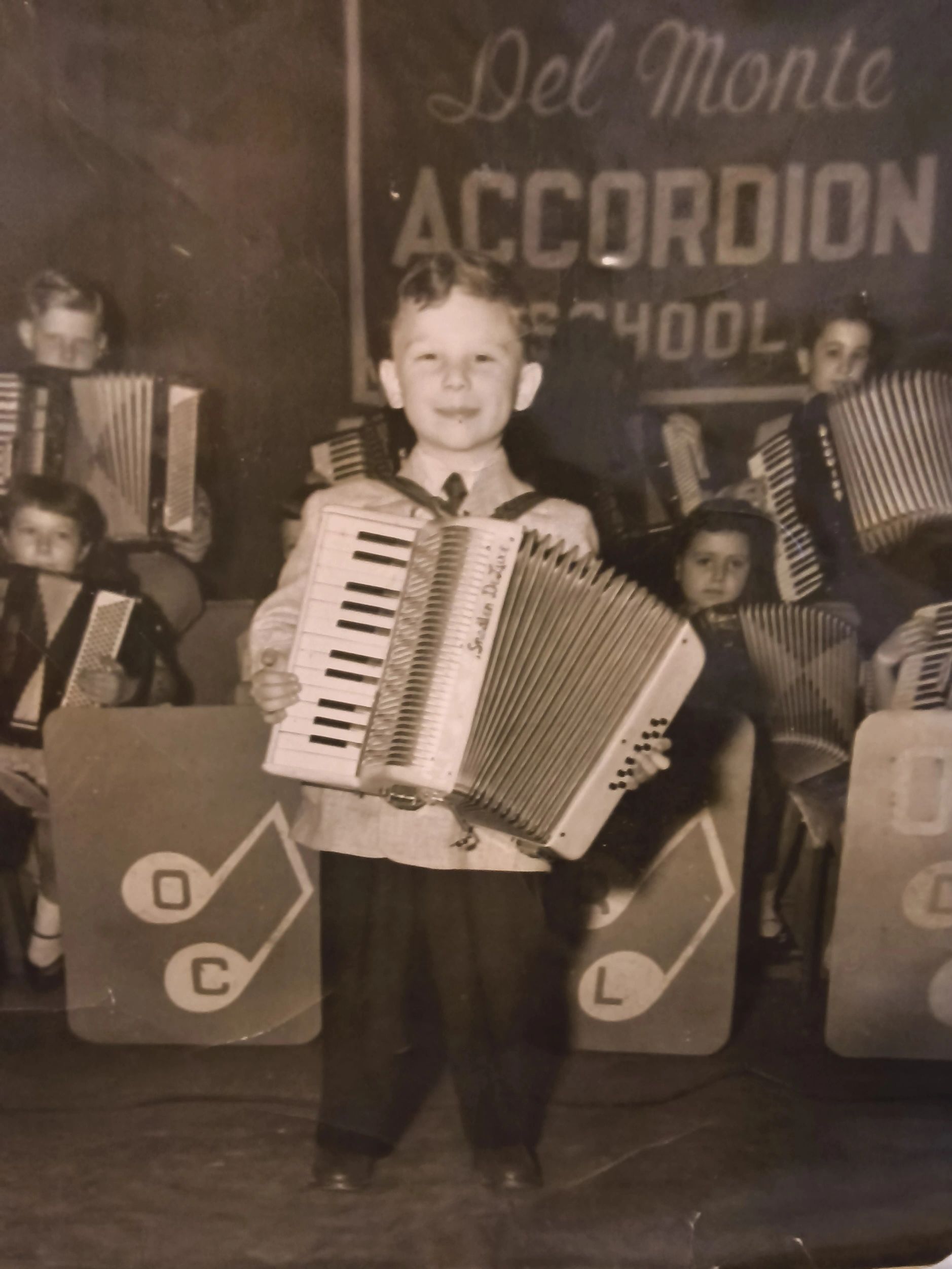 Age 4 performed Accordion on Merry Mailman Show. Still performing. 