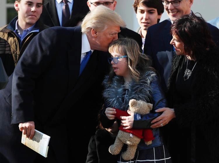 Kurt Kondrich's Daughter, Chloe, being greeted by President Donald Trump.