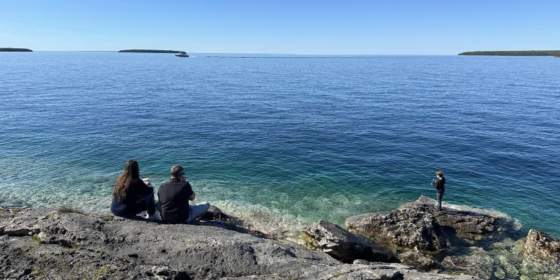 Peaceful reflection on Georgian Bay representing calm, clarity, and anxiety therapy in Ontario.