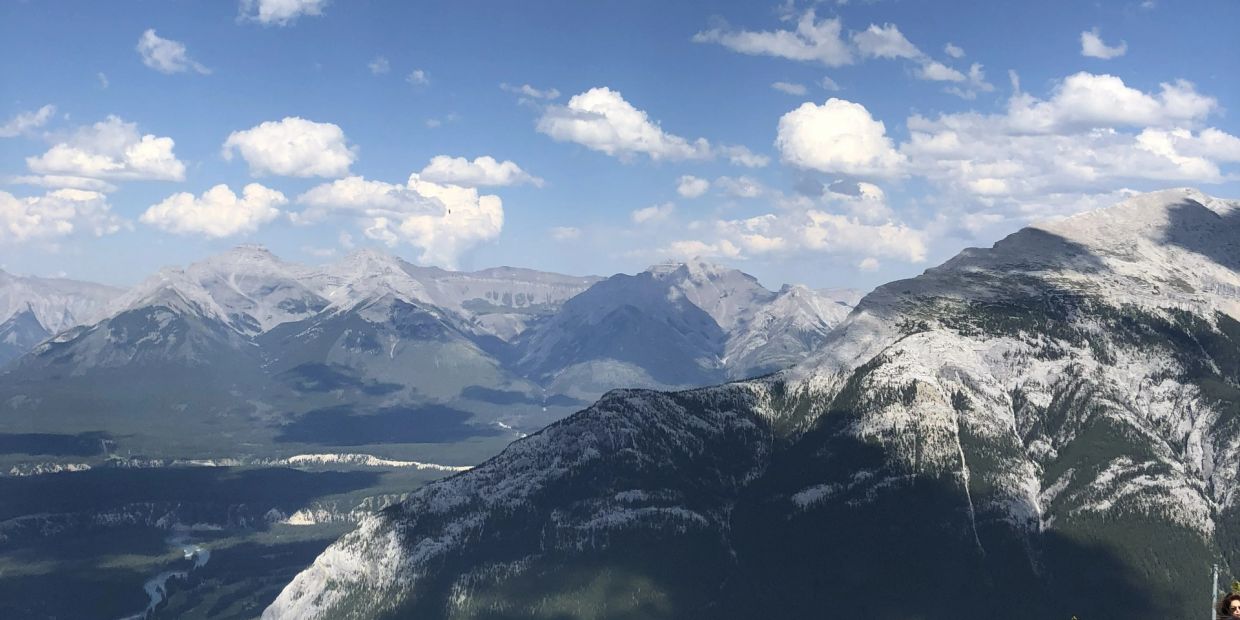 An expansive mountain landscape representing perspective and possibility.