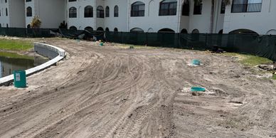 Construction site near apartment buildings.
