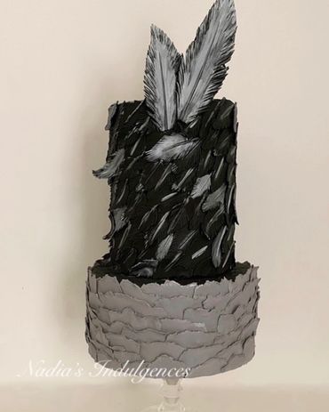 Contemporary wedding cake, fondant feathers, torn paper effect, black grey wedding cake with silver 