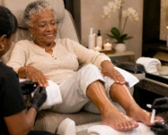 A luxurious manicure including nail filing shaping, cuticle care, sugar scrub exfoliation, and a moi
