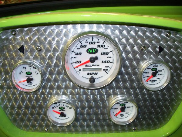 Aluminum gauge panel with engine turning detail and Autometer gauges in a 1960 Dodge truck