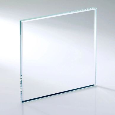 A clear square glass panel standing upright on a reflective surface.