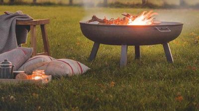 Custom fire pits in the grass
