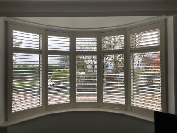 Shutters in a curved bay fitted in Higher Wheelton, Chorley